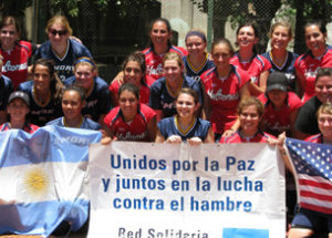 An American and Costa Rican softball team gather together for a picture after a tournament in San Antonio. 